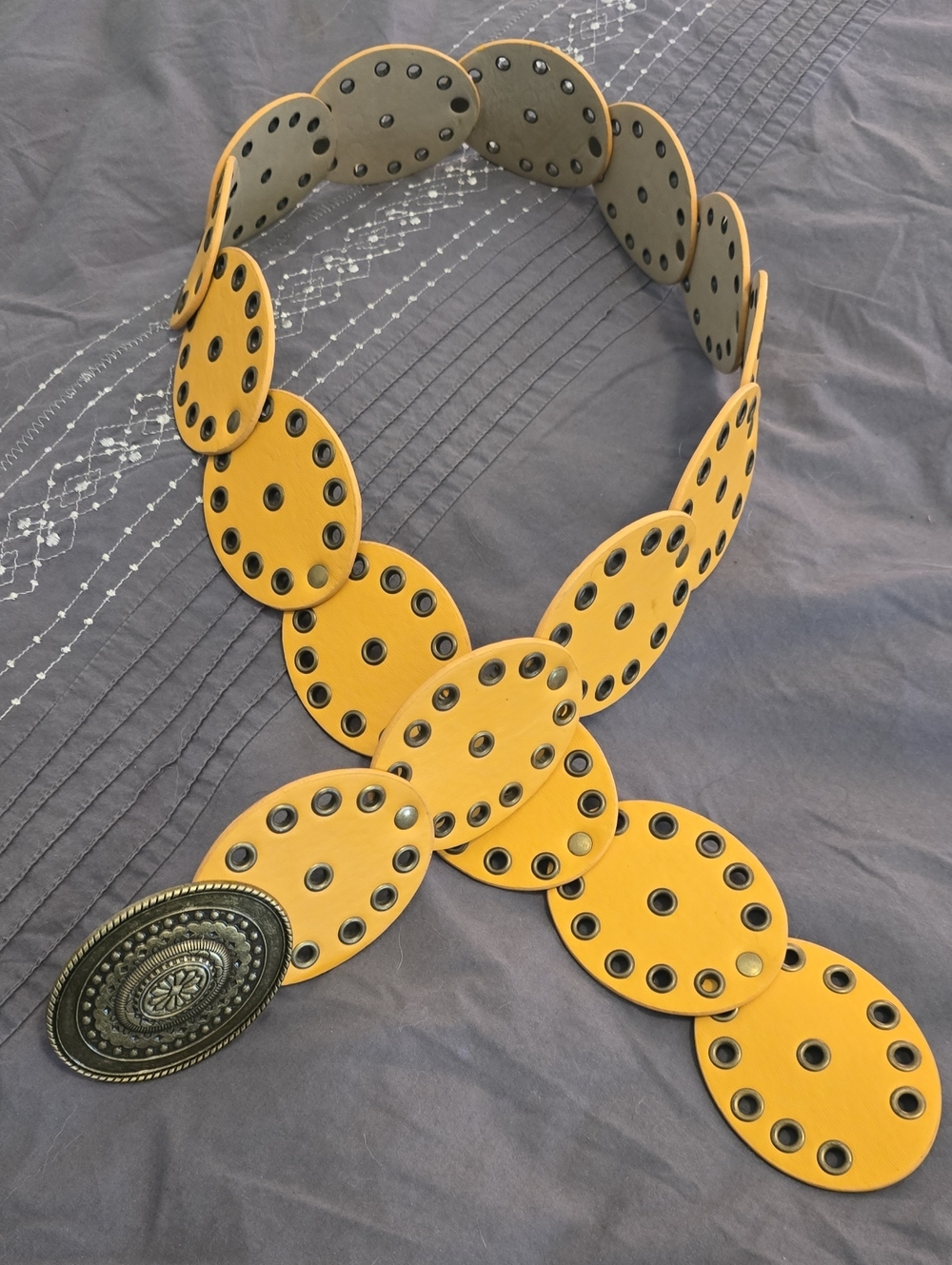 Mustard Yellow Eyelet Circle Belt with Ornate Buckle